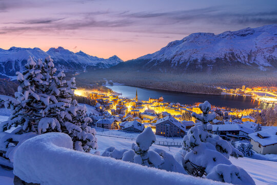 Fairy tale view of Saint Moritz on a snowy winter dusk, Engadine, Graubunden canton, Switzerland