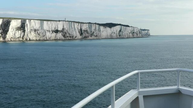 White Cliffs of Dover England from outbound ship, seen over ship's rail