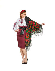 Beautiful adult Ukrainian women in national costume. Attractive Ukrainian woman wearing in traditional Ukrainian embroidery, isolated at white background.