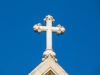 Catholic cross in the top of a church