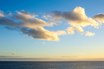 Naklejka na ściany i meble Beautiful clouds above seascape, Gran Canaria, Spain