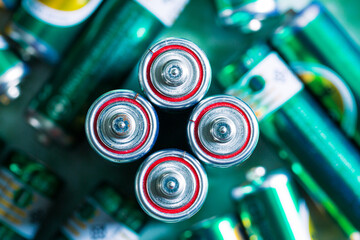 macro battery,Several batteries are next to each other,Close up of positive ends of discharged batteries of different sizes and formats, selective focus.