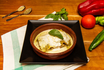 lasagna is a type of pasta. It is often served in overlapping sheets interspersed with layers of ingredients to taste, most often meat (ragù) in bolognese and béchamel sauce