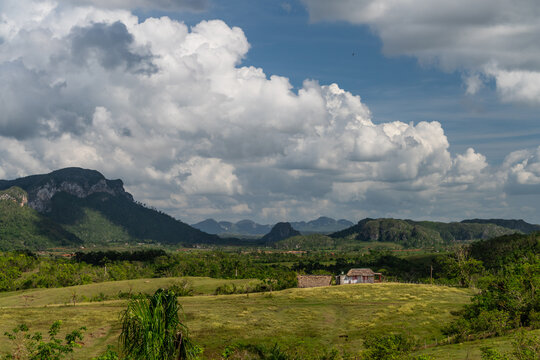 Small hut in valley under dramatic cloudscape near Vinales