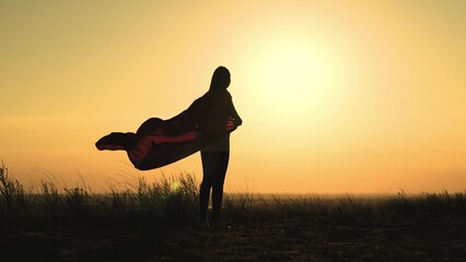 Superhero girl cloak cape super brave sunset. sky sun run child dream running happy free. hero...