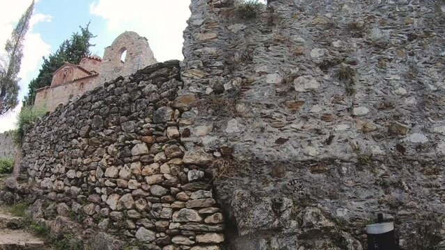 HYPERLAPSE Walking to byzantine medieval fortified despotate of Mystras on Mount Taygetus near Sparti town, Laconia, Peloponnese, Greece.