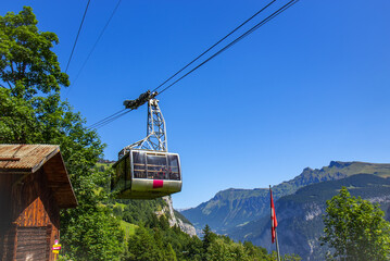 Big gondola in the Swiss Alps in the summer