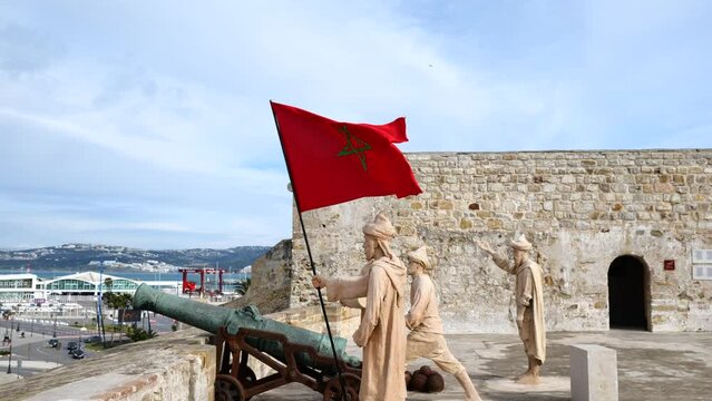 Moroccan flag and military sculptures