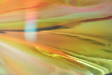 Holographic texture. Mother-of-pearl background. Yellow soft gradient. Rainbow gradient. Neon...