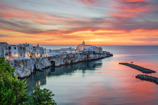 The old town on the promontory at sunrise, Vieste, Gargano peninsula, Foggia province, Puglia
