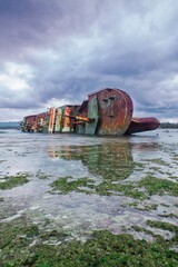 Shipwreck on pangandaran beach, indonesia
