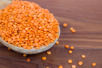 red lentils in a wooden bowl