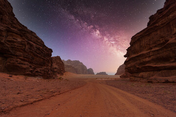 Wadi Rum desert, Jordan, The Valley of the Moon. Orange sand, Milky Way sky.