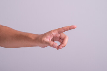 male caucasian hands isolated background showing gesture finger point to something or someone. man hands showing different gestures.