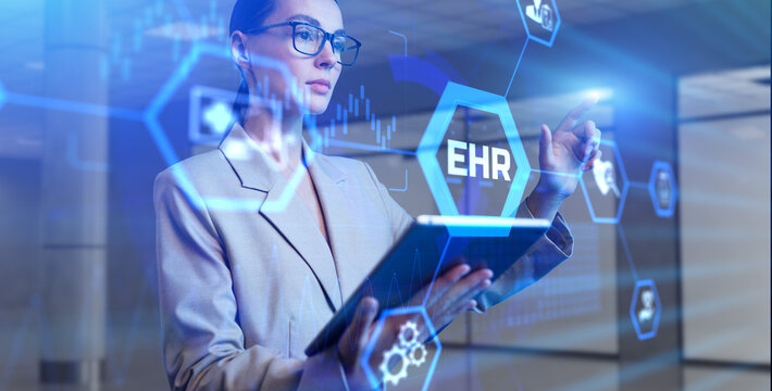 EHR Electronic health record medical and technology concept. Woman pressing button on virtual screen.