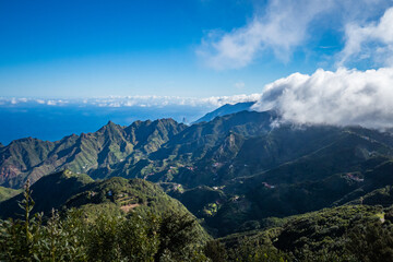 Aerial view of the national park of Anaga in Tenerife Canary Islands - Clouds rolling over beautiful mountain landscape	