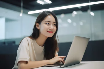 Fotobehang Office Working Girl, Pretty and Cute Asian Smile is sitting in front of Laptop Computer in Office Environment Background created with generative AI. © Surachetsh
