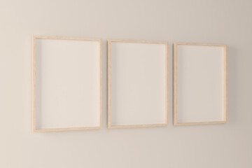 Perspective set of 3 wood frame mockup light wood frame model,triple frames standing on white wall