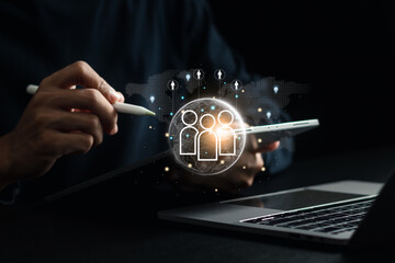 Human resource management concept. Businessman working on tablet to find effective personnel. Human...