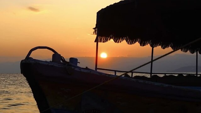 Tourist boat docked in Aqaba Jordan during sunset