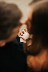 a man and a woman in love and their hands