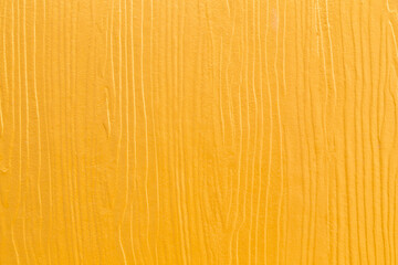 The detail of clean gold color wooden texture as background.