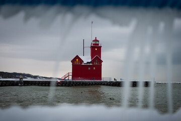 lighthouse through icicles
