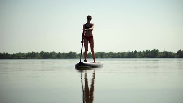 woman floating on sup board