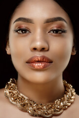 Beautiful black woman with jewelry. Young beauty model