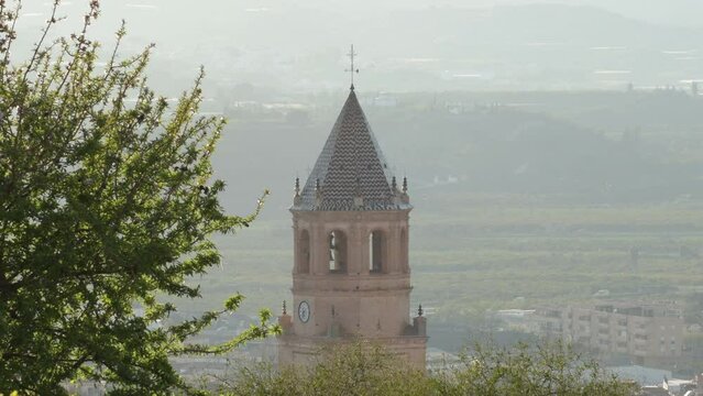 San Juan church bell tower at sunset , Velez Malaga, Spain
