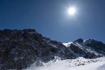 Mountain glacier in winter sunny day