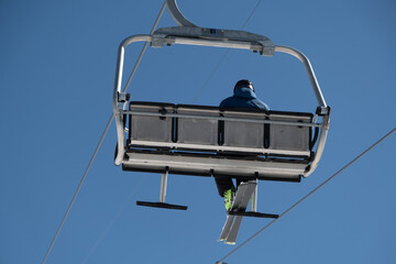 Skier in the cableway cabin