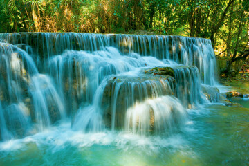 Beautiful Tat Kuang Si Waterfalls in rainforest. Luang Prabang, Laos.