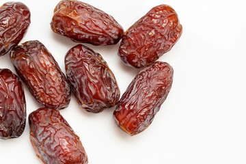 delicious dates isolated on white background. high angle view and free space for words