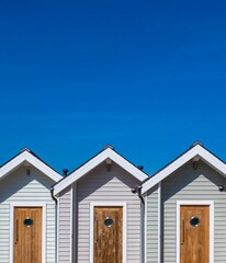 Vertical shot of the iconic beach huts on the seafront at Shaldon, Devon