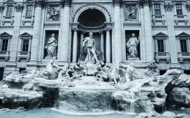 Iconic shot of sculptures at Trevi Fountain in Rome, Italy