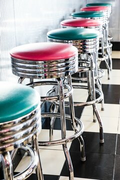 Vertical Shot Of Colored Stools At A Classic American 1950s Style Diner In Tennessee