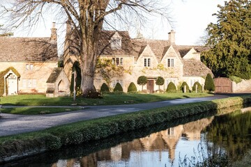 Fototapeta na wymiar Beautiful shot of the Lower Slaughter buildings in the Cotswolds, England