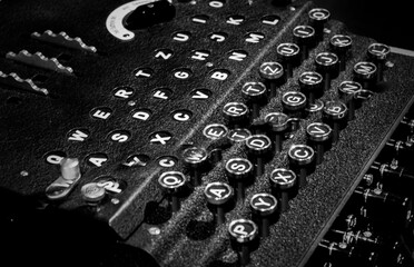 Closeup of black vintage Enigma machine used for encrypting and decrypting messages