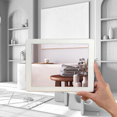 Augmented reality concept. Hand holding tablet with AR application used to simulate furniture products in custom architecture design, total white background, wooden bathroom