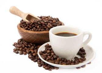 A cup of aromatic espresso coffee isolated on a white background. Coffee beans in a cup. Energy drink. A refreshing aromatic morning drink.