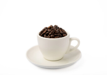 Fototapeta premium A cup of aromatic espresso coffee isolated on a white background. Coffee beans in a cup. Energy drink. A refreshing aromatic morning drink.