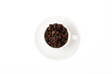 A cup of aromatic espresso coffee isolated on a white background. Coffee beans in a cup. Energy drink. A refreshing aromatic morning drink.
