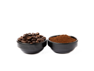Bowl of ground coffee and beans isolated on a white background.