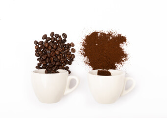 Ground coffee and coffee beans in coffee white cups isolated on white background.