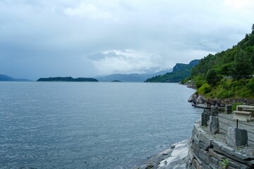 Beautiful shot of the scenic shore of the fjord in Kinsarvik, Norway
