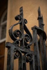 Closeup of vintage railing curls wrought from iron