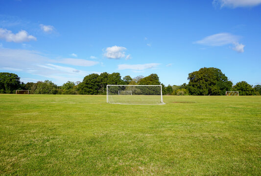 soccer field in public park. goals with nets for football matches or practice. sports football pitch 