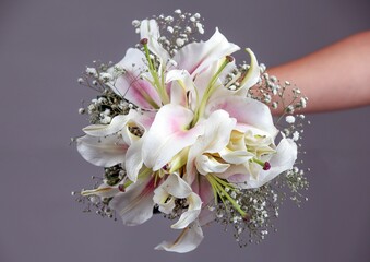 Vibrant wedding bouquet featuring a mix of white and pink flowers