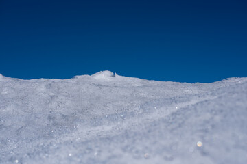 snow on a blue sky background